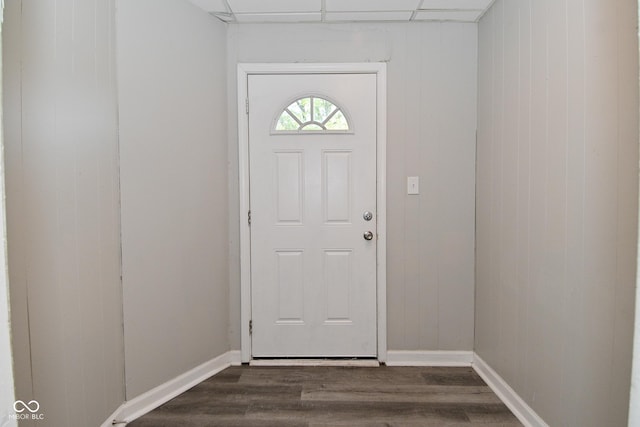 623 Orange St, Indianapolis, IN 46203 - entryway with dark wood finished floors, baseboards, and wooden walls