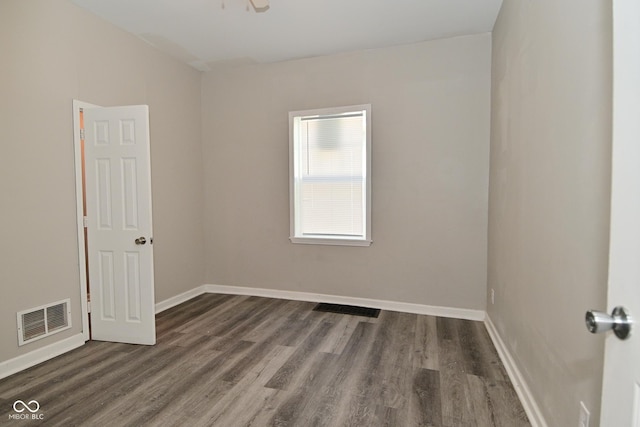 623 Orange St, Indianapolis, IN 46203 - empty room featuring wood finished floors and baseboards