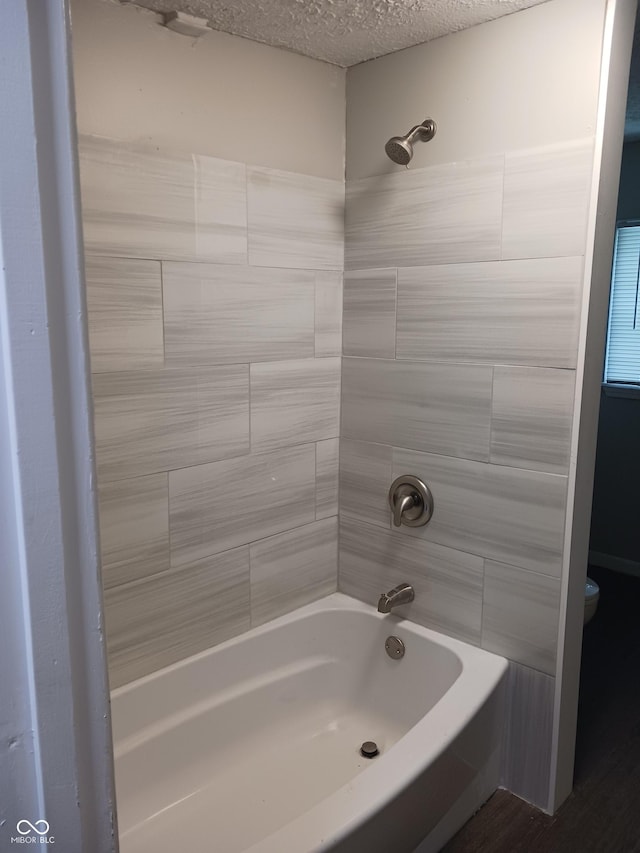 623 Orange St, Indianapolis, IN 46203 - full bathroom with  shower combination and a textured ceiling