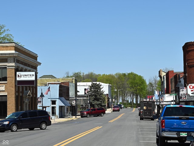 24391 Stout St, Sheridan, IN 46069 - view of asphalt road featuring street lighting and curbs