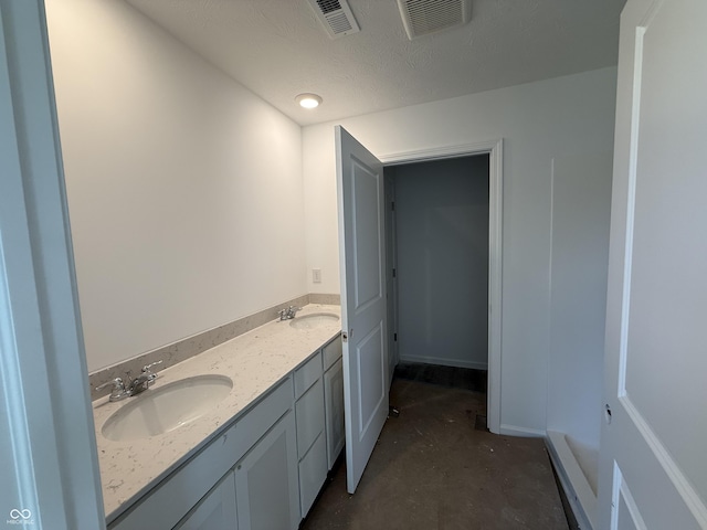 24391 Stout St, Sheridan, IN 46069 - bathroom featuring unfinished concrete flooring and double vanity