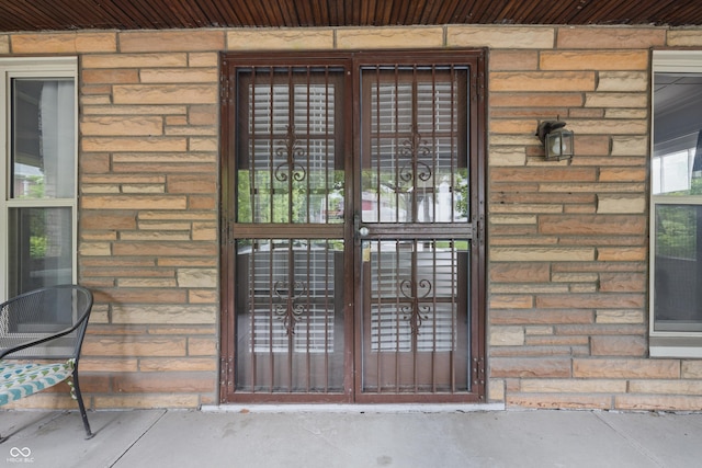 property entrance featuring french doors