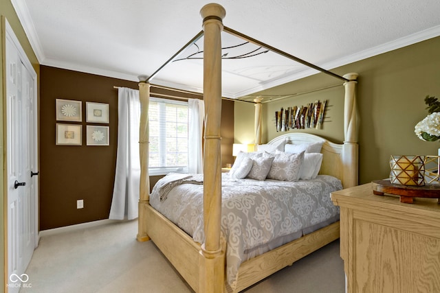 bedroom with light colored carpet, crown molding, and baseboards