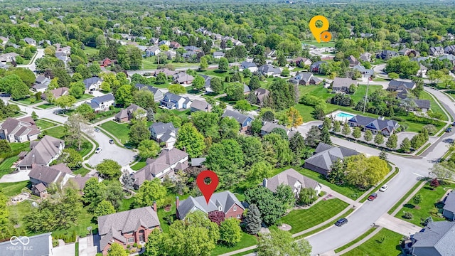 aerial overview of property's location with nearby suburban area