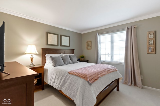 bedroom with crown molding, light carpet, and baseboards