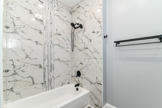 bathroom with washtub / shower combination