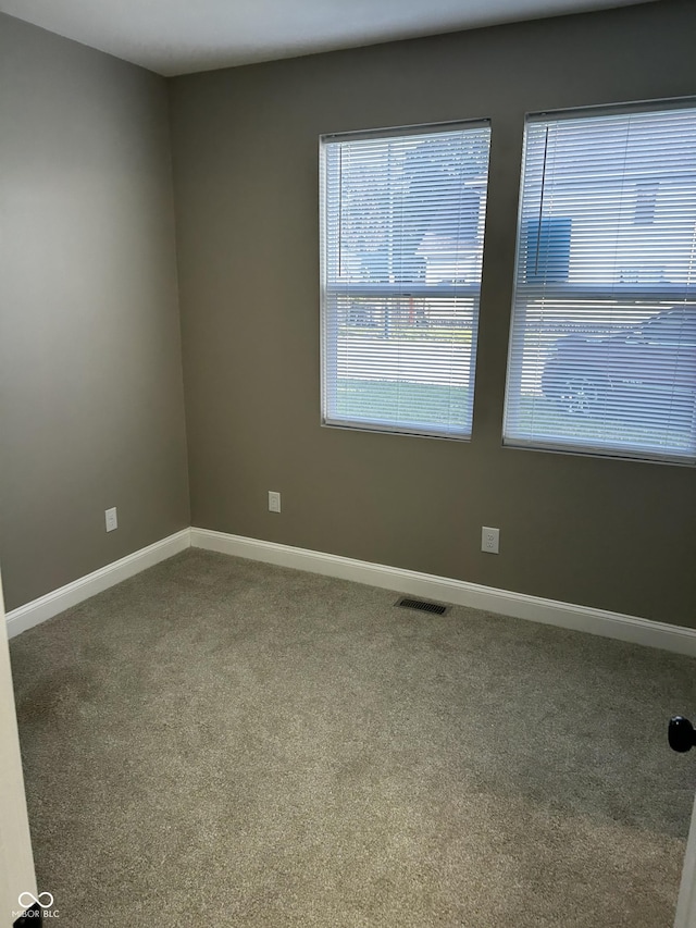 336 W 29th St, Indianapolis, IN 46208 - carpeted spare room featuring baseboards
