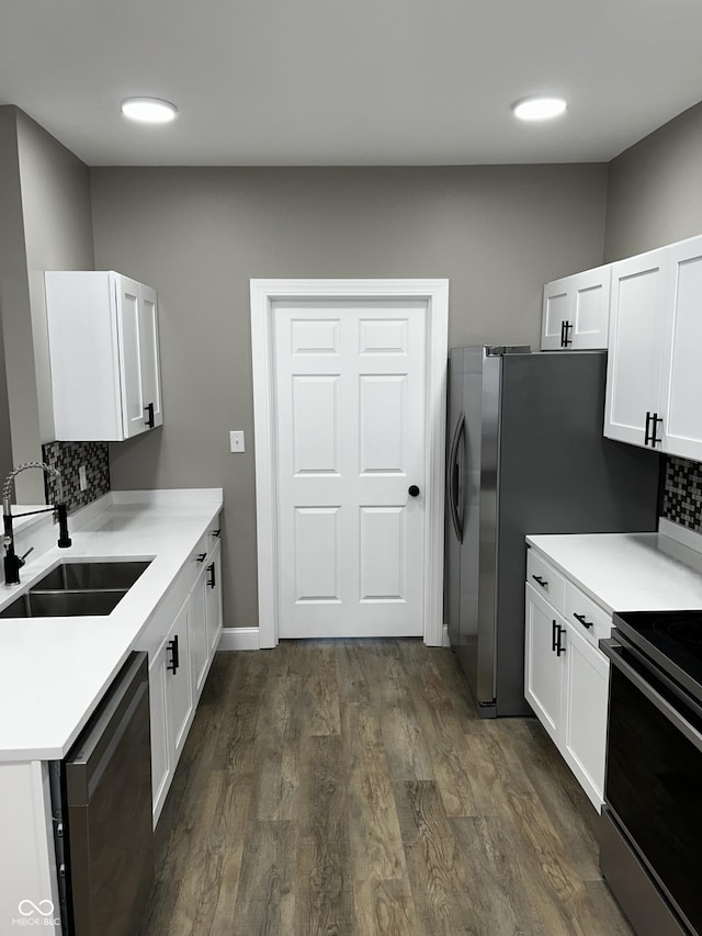 336 W 29th St, Indianapolis, IN 46208 - kitchen featuring a sink, dishwasher, decorative backsplash, and white cabinetry