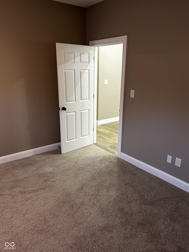 336 W 29th St, Indianapolis, IN 46208 - spare room featuring carpet and baseboards