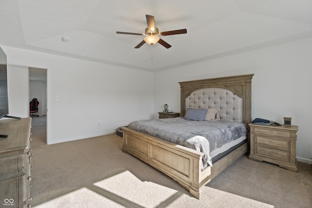 6903 Aster Dr, Pendleton, IN 46064 - carpeted bedroom featuring a tray ceiling, baseboards, and ceiling fan