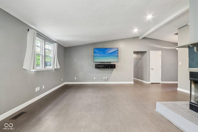unfurnished living room with baseboards and wood finished floors