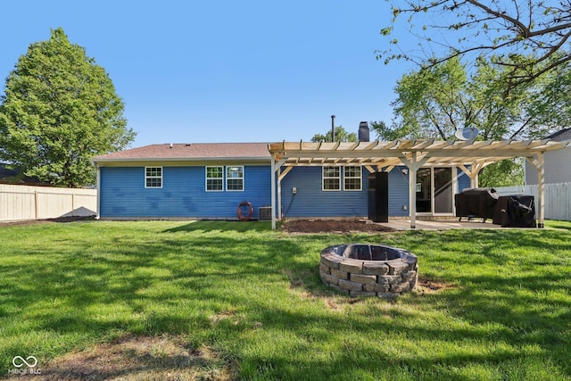 rear view of house featuring an outdoor fire pit, a pergola, a chimney, and a patio