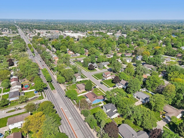 aerial perspective of suburban area featuring a major roadway