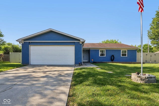 single story home with concrete driveway and an attached garage