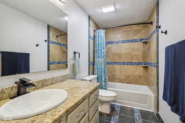bathroom featuring shower / tub combo with curtain, a textured ceiling, vanity, and toilet