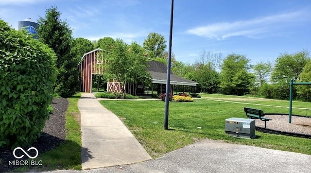 surrounding community with a lawn