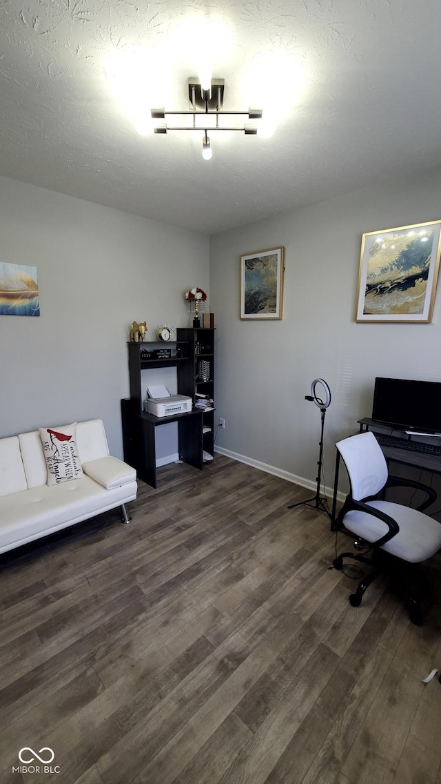 office space featuring dark wood-style floors and baseboards