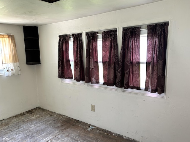 205 N Sheffield Ave, Indianapolis, IN 46222 - empty room featuring healthy amount of natural light and wood finished floors