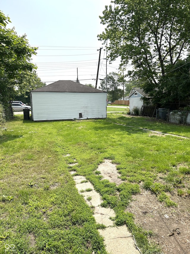 205 N Sheffield Ave, Indianapolis, IN 46222 - view of grassy yard with an outbuilding