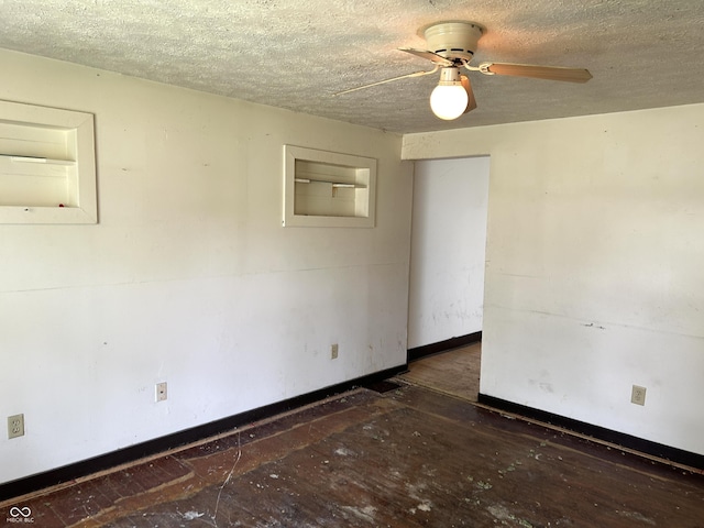 205 N Sheffield Ave, Indianapolis, IN 46222 - empty room featuring ceiling fan, a textured ceiling, and baseboards