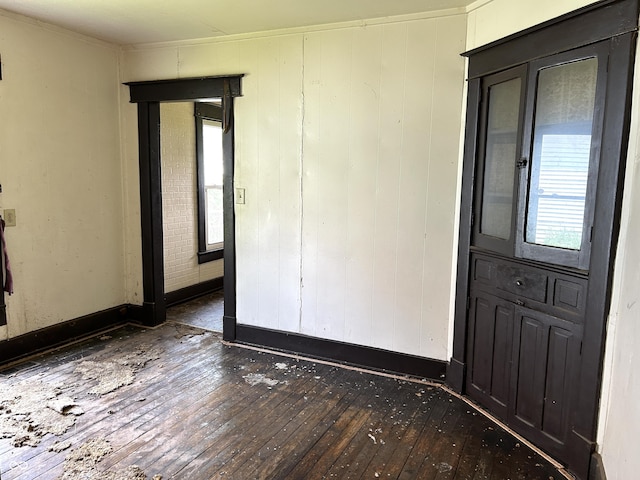 205 N Sheffield Ave, Indianapolis, IN 46222 - empty room featuring wood-type flooring, healthy amount of natural light, and baseboards