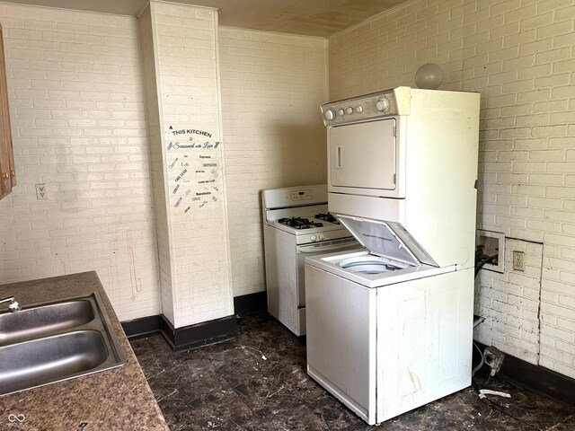 205 N Sheffield Ave, Indianapolis, IN 46222 - washroom featuring estacked washer and dryer