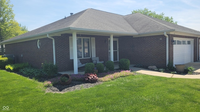 123 Old Farm Rd, Danville, IN 46122 - view of front of property featuring brick siding, a front lawn, a porch, and a garage