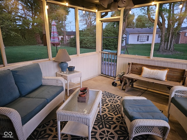 sunroom / solarium with an outdoor hangout area