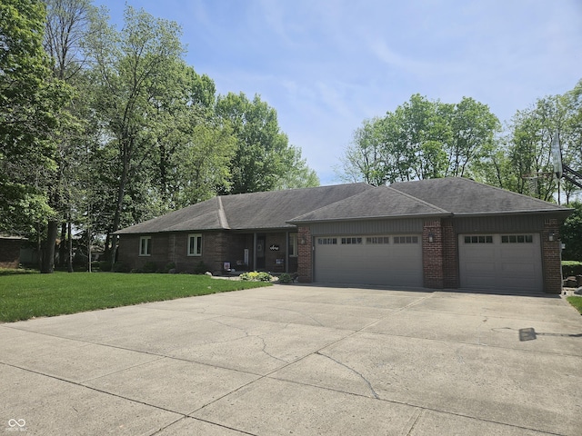 single story home with brick siding, an attached garage, concrete driveway, a front lawn, and roof with shingles