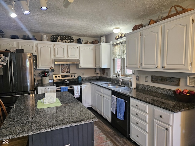 kitchen featuring black appliances, a sink, under cabinet range hood, white cabinets, and a textured ceiling