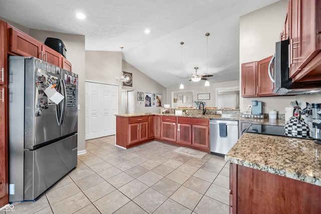 kitchen featuring appliances with stainless steel finishes, a peninsula, light tile patterned flooring, vaulted ceiling, and light stone countertops