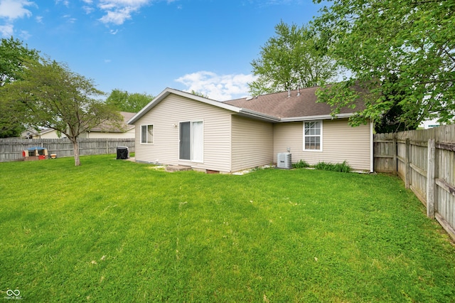 rear view of property featuring roof with shingles