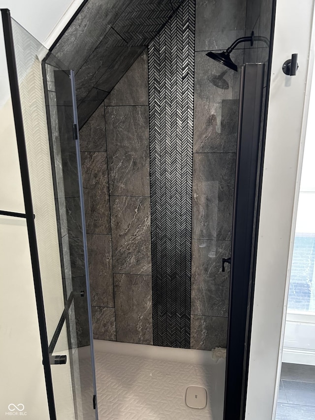 bathroom with a shower stall
