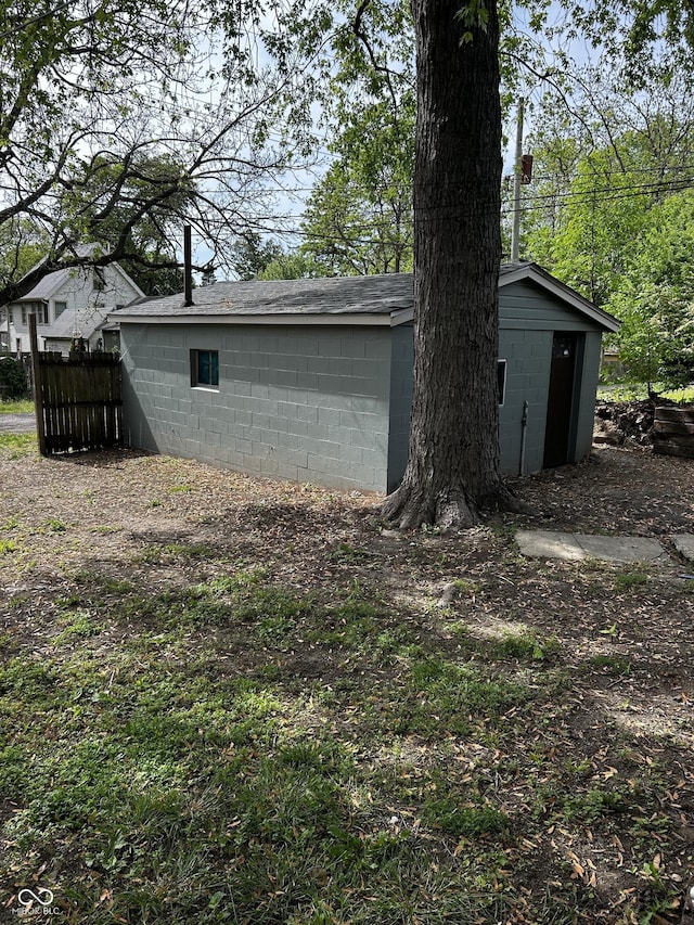 garage with fence