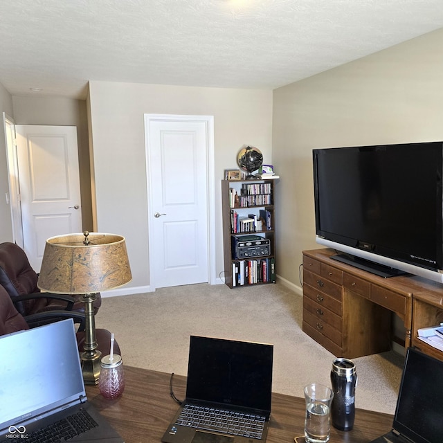 6403 Yuma Ct, Whitestown, IN 46075 - living area featuring a desk, carpet floors, and baseboards