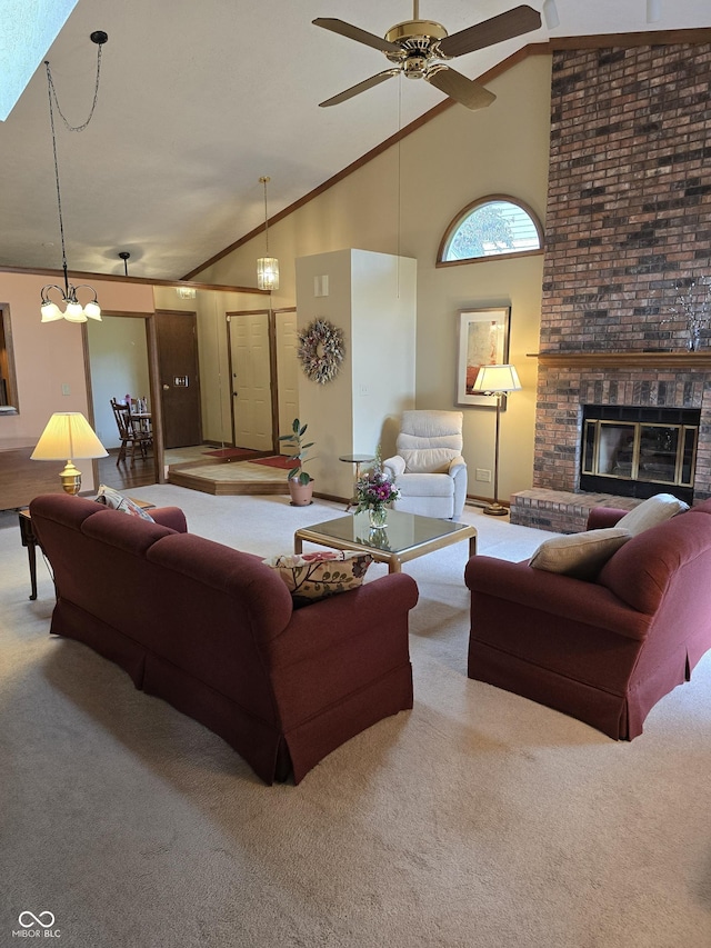 8055 Foxchase Dr, Indianapolis, IN 46256 - carpeted living area featuring high vaulted ceiling, a ceiling fan, a fireplace, and a chandelier