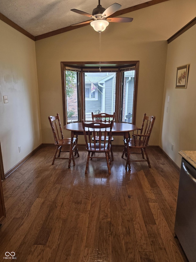 8055 Foxchase Dr, Indianapolis, IN 46256 - dining space featuring a ceiling fan, dark wood-style flooring, ornamental molding, and a textured ceiling