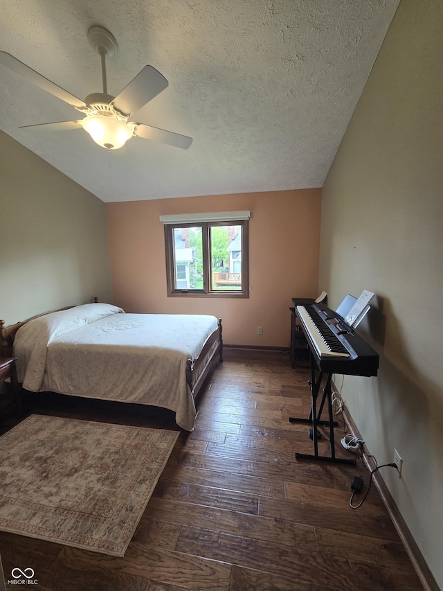 8055 Foxchase Dr, Indianapolis, IN 46256 - bedroom with dark wood-type flooring, a textured ceiling, and ceiling fan