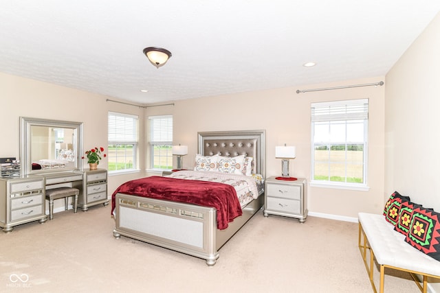 9860 Gallop Ln, Fishers, IN 46040 - bedroom with light carpet and multiple windows