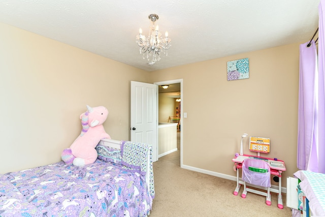9860 Gallop Ln, Fishers, IN 46040 - bedroom with a chandelier and light colored carpet