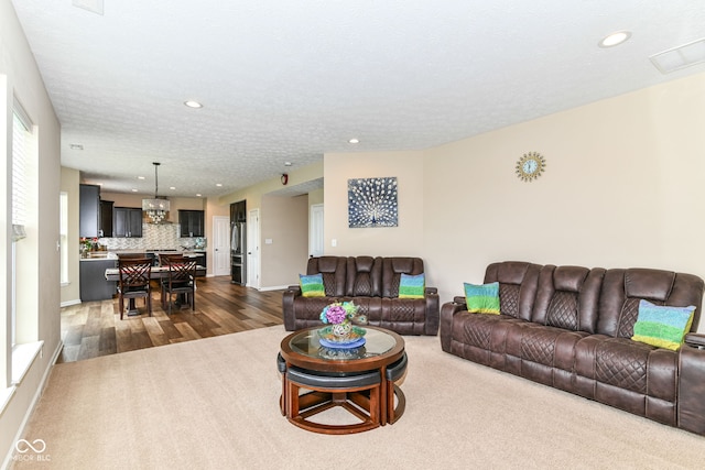 9860 Gallop Ln, Fishers, IN 46040 - living area with dark wood-style floors and recessed lighting