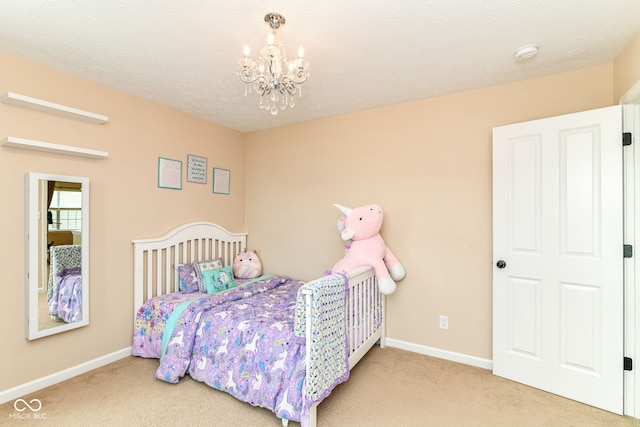 9860 Gallop Ln, Fishers, IN 46040 - carpeted bedroom featuring a chandelier and baseboards
