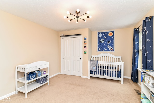 9860 Gallop Ln, Fishers, IN 46040 - bedroom featuring carpet floors, a chandelier, and a closet