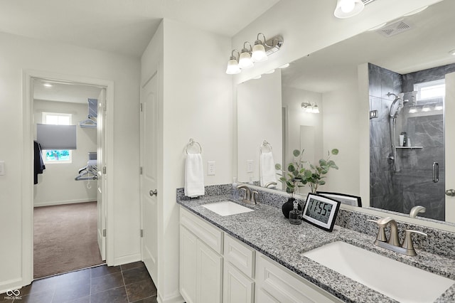 5366 Laurel Crest Run, Noblesville, IN 46062 - bathroom with double vanity, a stall shower, tile patterned flooring, and baseboards
