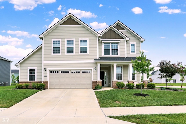 5366 Laurel Crest Run, Noblesville, IN 46062 - craftsman-style home with a garage, a front lawn, board and batten siding, and driveway