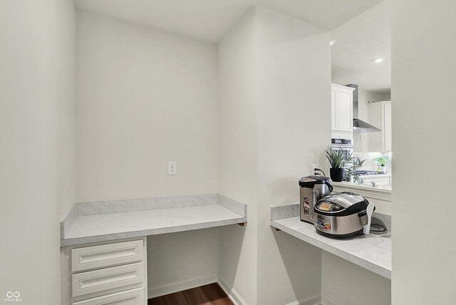 5366 Laurel Crest Run, Noblesville, IN 46062 - office featuring built in desk, dark wood-style flooring, and baseboards