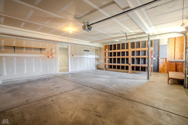 6491 Enclave Blvd, Greenwood, IN 46143 - garage featuring a garage door opener and electric panel