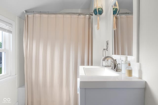 2336 Sycamore St, Columbus, IN 47201 - full bathroom featuring vanity, plenty of natural light, and a shower with shower curtain