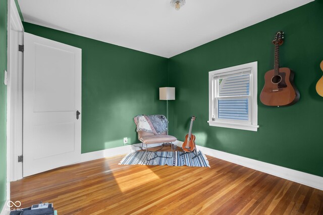 2336 Sycamore St, Columbus, IN 47201 - living area with wood finished floors and baseboards