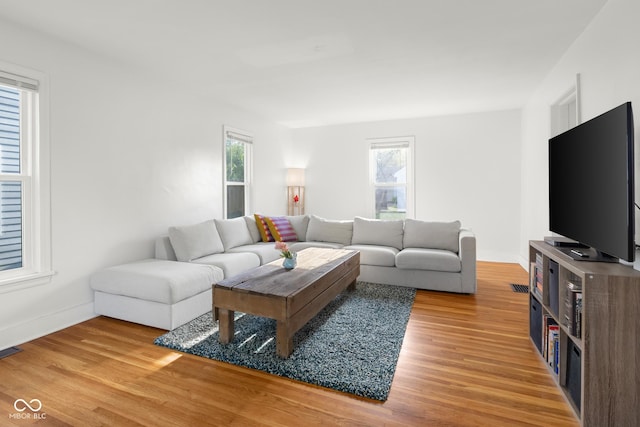 2336 Sycamore St, Columbus, IN 47201 - living area with light wood-type flooring and baseboards
